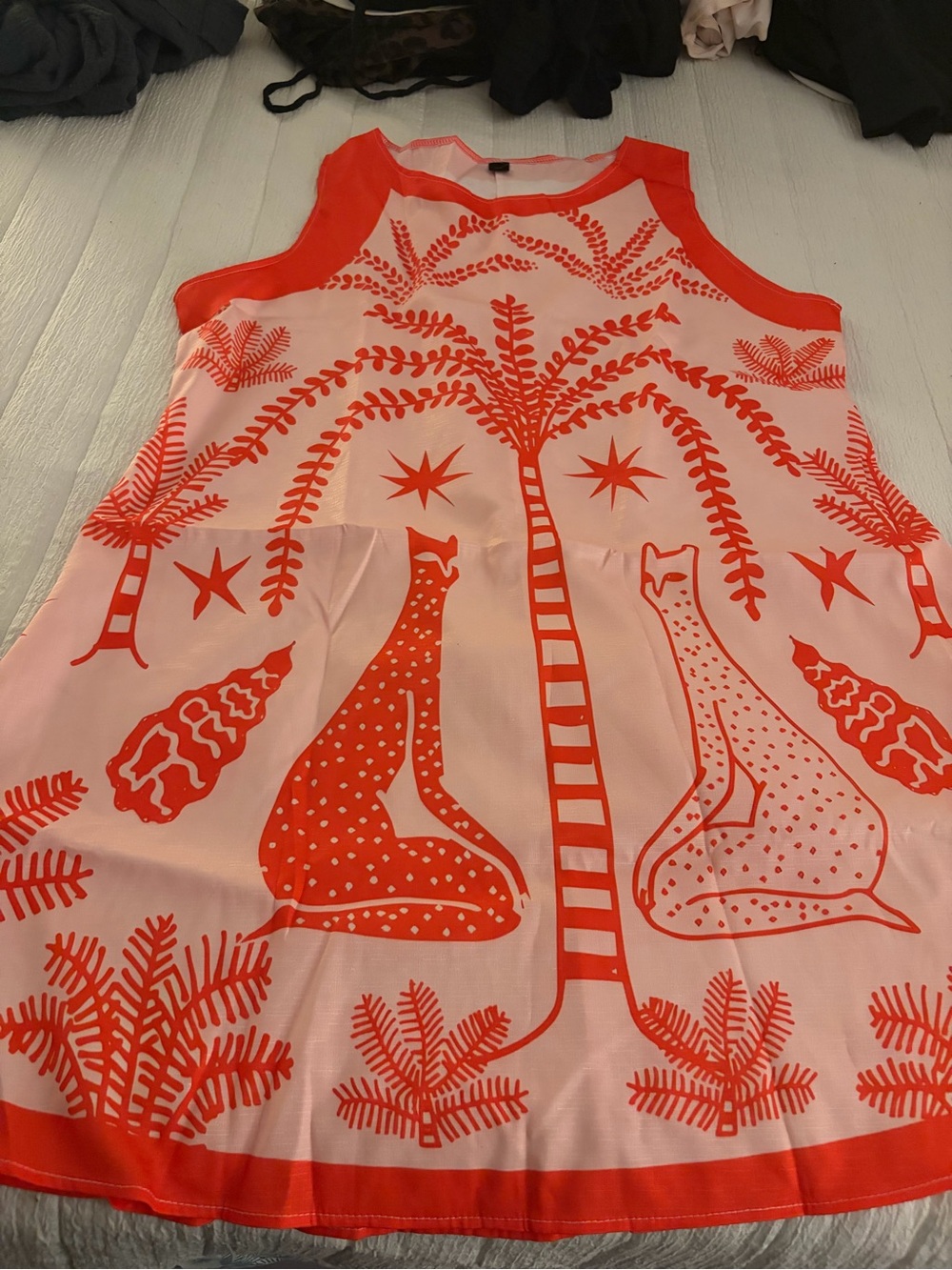Sleeveless Pink Dress with Bold Coral Print